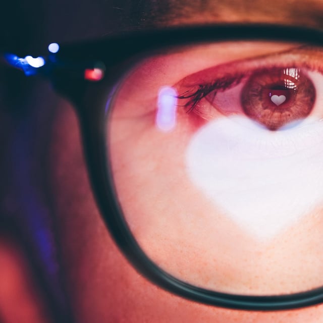 Woman with a heart reflected in her eyes