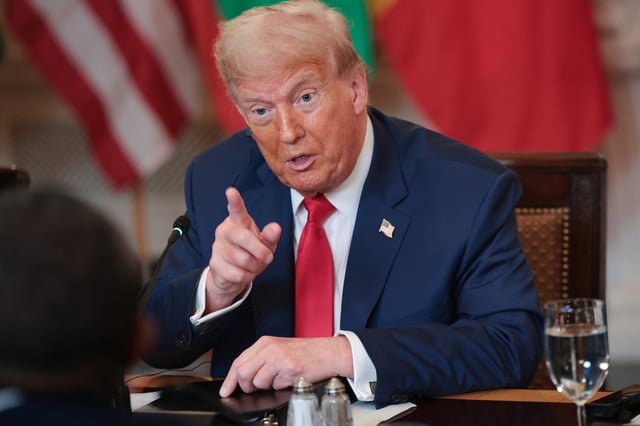 U.S. President Donald Trump answers questions during a multilateral lunch with African leaders in the State Dining Room of the White House July 9, 2025 in Washington, DC.