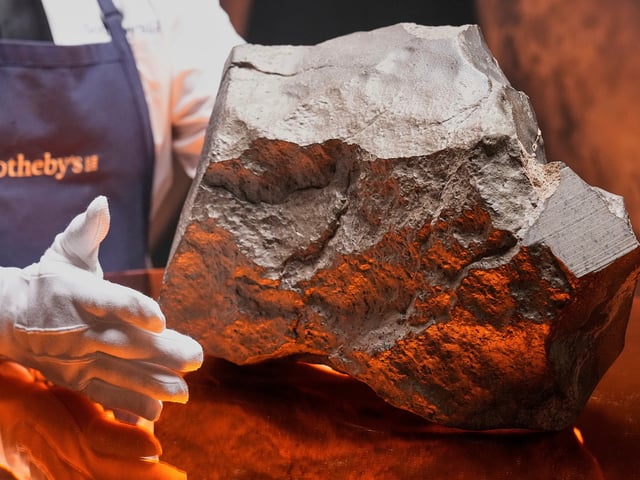 FILE — A Martian meteorite, weighing 54.388 lbs. (24.67 kg), said to be the largest piece of Mars on Earth, at Sotheby's, in New York, July 9, 2025. was sold for just over $5-million at an auction of rare geological and archaeological objects. at Sotheby's, Wednesday, July 16, 2025. (AP Photo/Richard Drew, File)