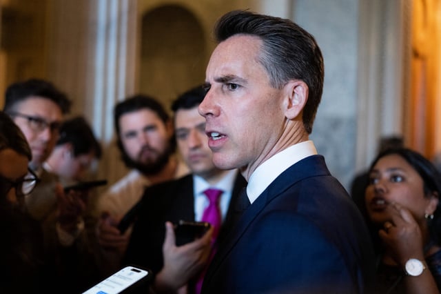 Sen. Josh Hawley, R-Mo., talks with reporters after the Senate luncheons in the Capitol on Tuesday.