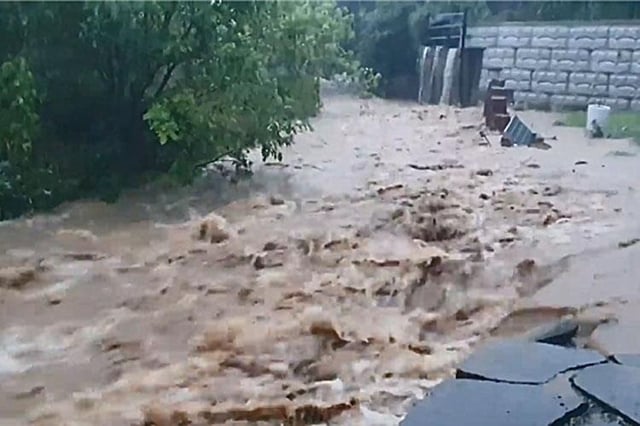 This image shows a flooding stream in Dangjin, South Chungcheong Province, on July 17, 2025. (PHOTO NOT FOR SALE) (Yonhap)