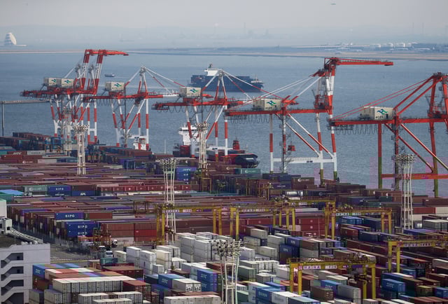 Shipping containers are seen at a port in Tokyo, Japan, March 22, 2017. REUTERS/Issei Kato/ File Photo