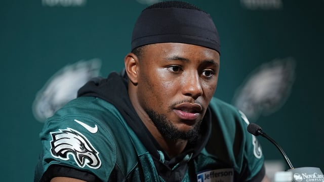 Philadelphia Eagles' Saquon Barkley speaks during a news conference at NFL football minicamp.
