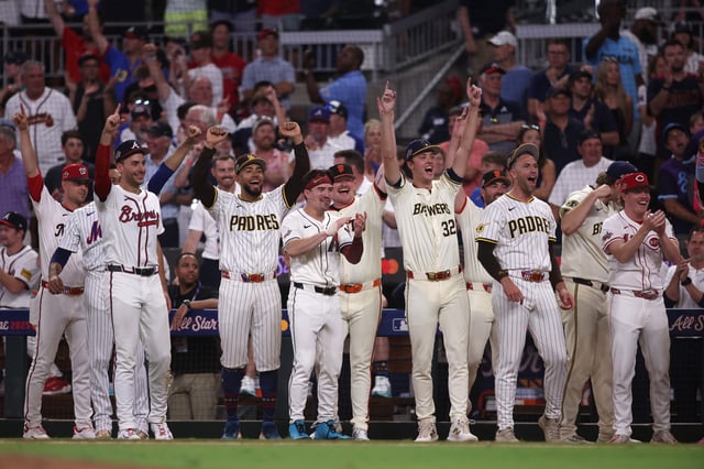 Jul 15, 2025; Cumberland, Georgia, USA; The National League players celebrate during in a home run swing off tiebreaker in the 2025 MLB All Star Game at Truist Park. Mandatory Credit: Brett Davis-Imagn Images