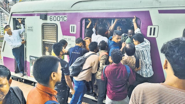 Thane, India – June 14, 2025: A large crowd of commuters struggles to board local trains at Diva Railway Station, a week after the Mumbra train accident, emphasizing the need for urgent reforms in Mumbai's suburban rail network, in Thane, Mumbai, India, on Saturday, June 14, 2025. (Photo by Praful Gangurde / Hindustan Times) (Praful Gangurde)