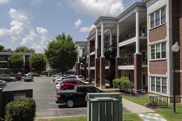 Apartment buildings are seen at the Stoddard Johnston Scholar House, Friday, July 11, 2025, in Louisville, Ky. (AP Photo/Jon Cherry)