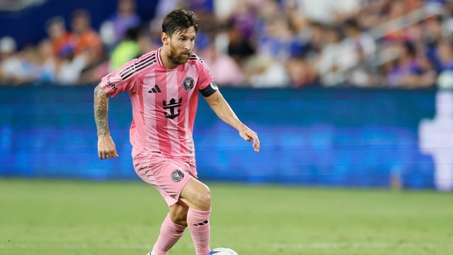 Inter Miami's Lionel Messi dribbles the ball against FC Cincinnati during the second half of an MLS soccer match