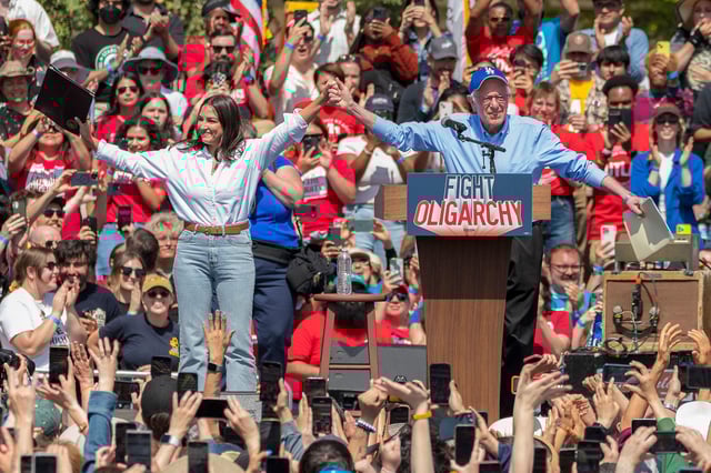 Rep. Alexandria Ocasio-Cortez and Sen. Bernie Sanders hold a "Fighting Oligarchy" rally in Los Angeles on April 12, 2025.