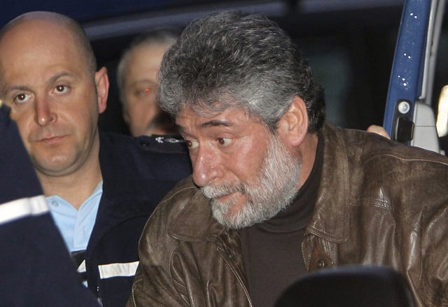 FILE - Georges Ibrahim Abdallah arrives at the Pau appeal court, southwestern France, Thursday Feb. 18, 2010. (AP Photo/Bob Edme, File)