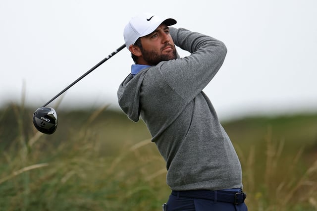 US golfer Scottie Scheffler watches his drive from the 8th tee during practice ahead of the 153rd Open Championship at Royal Portrush golf club in Northern Ireland on July 15, 2025. (Photo by HENRY NICHOLLS / AFP) / RESTRICTED TO EDITORIAL USE (Photo by HENRY NICHOLLS/AFP via Getty Images)          