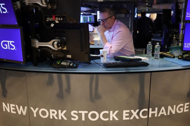 Traders work on the floor of the New York Stock Exchange (NYSE) at the opening bell in New York City on March 24, 2025. Stock markets mostly rose on Monday as worries about fresh US tariffs pencilled in for next week were tempered by hopes that US President Donald Trump was considering a more targeted approach. (Photo by CHARLY TRIBALLEAU / AFP) (Photo by CHARLY TRIBALLEAU/AFP via Getty Images)