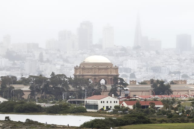 Fog covers the downtown skyline of San Francisco, Wednesday, July 16, 2025.