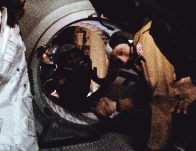 The culmination of years of international negotiations and training, Apollo and Soyuz linked up in space in July 1975. When the hatches opened, their respective commanders, Thomas Stafford and Aleksey Leonov, shook hands. Credit: NASA