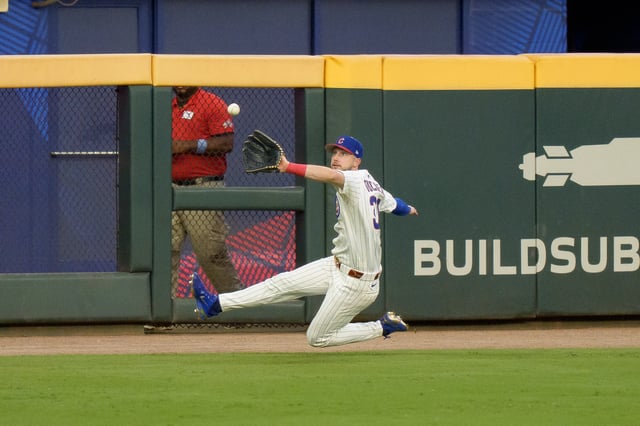 ATLANTA, GEORGIA - JULY 15: Kyle Tucker #30 of the Chicago Cubs makes a diving catch in left field during the second inning of the MLB All-Star Game at Truist Park on July 15, 2025 in Atlanta, Georgia.