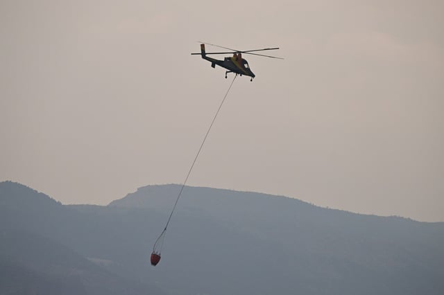 A helicopter works at the site of Turner Gulch fire in Gateway, Colorado on Wednesday, July 16, 2025. (Photo by Hyoung Chang/The Denver Post)