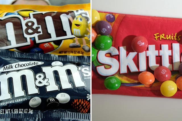 M&amp;M&#39;s candies pictured in New York City (left) and a packed of Skittles seen in the Netherlands (right).