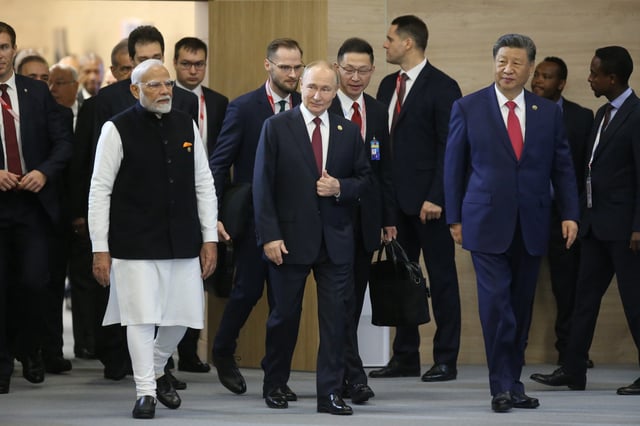 Indian Prime Minister Narendra Modi, left, Russian President Vladimir Putin, center, and Chinese President Xi Jinping, right, at a BRICS summit, on October 23, 2024, in Kazan, Russia. Russia hopes to revive a three-way bloc with India and China.