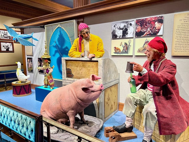 Early Audio-Animatronics from "Pirates of the Caribbean" and "It's a Small World" are on display inside the Main Street Opera House at Disneyland.