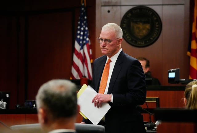 Emilie Kiser's attorney, Kevin O'Malley, heads back to his seat after presenting to Judge Christopher Whitten during a hearing at the Maricopa County Superior Court in Phoenix, on June 3, 2025.
