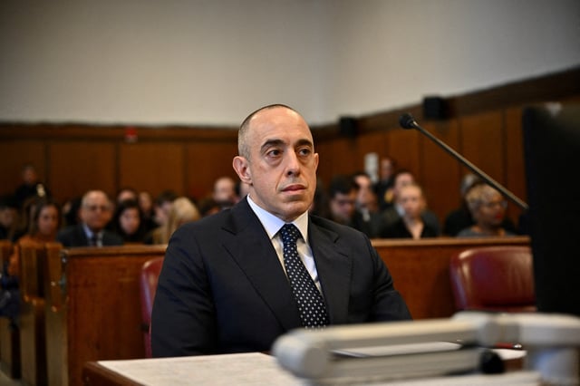 Attorney Emil Bove looks on as U.S. President-elect Donald Trump appears remotely for a sentencing hearing in front of New York State Judge Juan Merchan in the criminal case in which he was convicted in 2024 on charges involving hush money paid to a porn star, at New York Criminal Court in Manhattan in New York City, U.S., on January 10, 2025.     ANGELA WEISS/Pool via REUTERS/File Photo