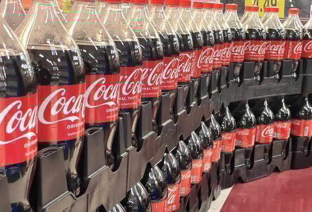 Bottles of Coca-Cola are displayed at a grocery store in San Rafael, California on April 24, 2023.