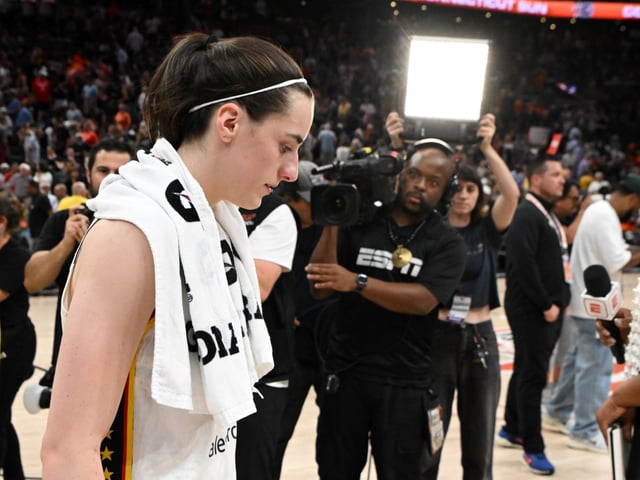 BOSTON, MASSACHUSETTS - JULY 15: Caitlin Clark #22 of the Indiana Fever walks off of the court after a game against the Connecticut Sun during the second half at the TD Garden on July 15, 2025 in Boston, Massachusetts. NOTE TO USER: User expressly acknowledges and agrees that, by downloading and/or using this Photograph, user is consenting to the terms and conditions of the Getty Images License Agreement. (Photo by Brian Fluharty/Getty Images)