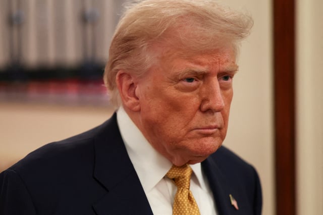 U.S President Donald Trump looks on on the day he signs the HALT Fentanyl Act, in the East Room at the White House in Washington, D.C., U.S., July 16, 2025. REUTERS/Umit Bektas/File Photo
