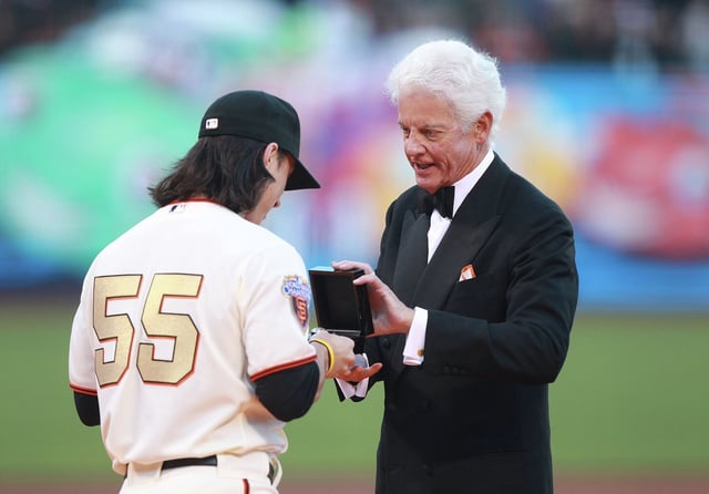 FILE: Tim Lincecum of the San Francisco Giants receives his World Series ring from managing partner Bill Neukom before his game against the St. Louis Cardinals at AT&amp;T Park on April 9, 2011, in San Francisco.