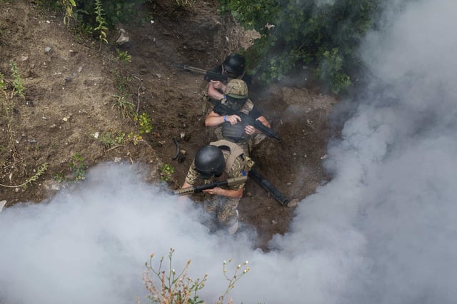 Ukrainian 3rd Assault Brigade recruits train at the polygon in Kyiv region, Ukraine, on Wednesday, July 16, 2025. 