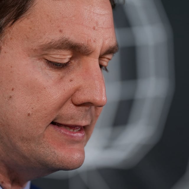 B.C. Premier David Eby pauses to look at his notes during an announcement at Electronic Arts in Burnaby, B.C., on Monday, July 7, 2025. THE CANADIAN PRESS/Darryl Dyck