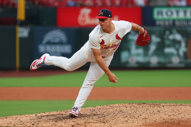 ST LOUIS, MISSOURI - JULY 13: Ryan Helsley #56 of the St. Louis Cardinals delivers a pitch against the Atlanta Braves in the ninth inning at Busch Stadium on July 13, 2025 in St Louis, Missouri.