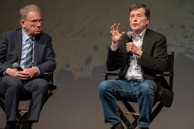 Documentarian Ken Burns, right, makes a point as Atlantic magazine editor Jeffrey Goldberg looks on during a discussion about the upcoming PBS limited series “The American Revolution” at the Palace of Fine Arts in San Francisco on Wednesday, July 16.