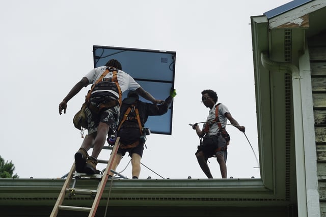 Solar panels are installed on a home in Chapel Hill, N.C., Wednesday, July 2, 2025. (AP Photo/Allen G. Breed)