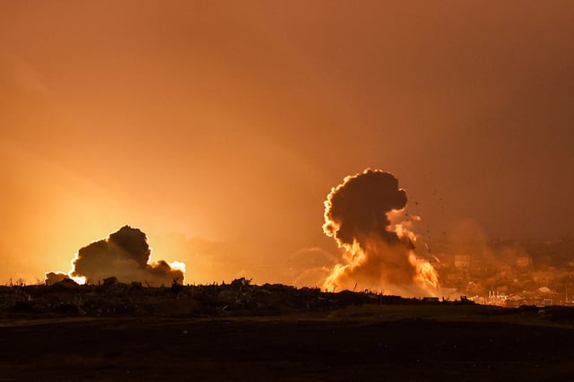 Smoke rises in Gaza after Israeli airstrikes as seen from the Israeli side of the Israel-Gaza border, July 16, 2025. REUTERS/Amir Cohen/File Photo