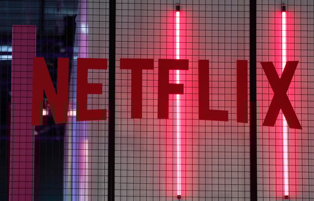 FILE- In this Nov. 4, 2017, file photo, the logo of entertainment company Netflix is pictured in Paris. (AP Photo/Christophe Ena, File)