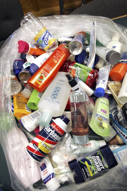 FILE- A bag full of various banned items collected from passengers' carry-on bags is displayed at the Portland International Jetport in Portland, Maine, Aug. 10, 2006. (AP Photo/Robert F. Bukaty, File)