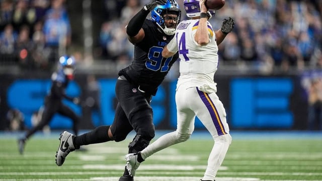 Syndication: Detroit Free Press. Detroit Lions defensive end Levi Onwuzurike (91) pressures Minnesota Vikings quarterback Sam Darnold (14) during the second half at Ford Field in Detroit on Sunday, Jan. 5, 2025.