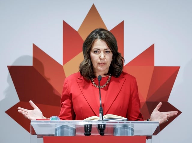 Alberta Premier Danielle Smith speaks to the media in Calgary, Monday, Sept. 18, 2023. The Alberta government will begin telephone town hall consultations with the public starting next week on whether to quit the Canada Pension Plan. 