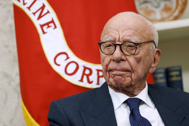 Former Executive Chairman of Fox Corp Rupert Murdoch listens as U.S. President Donald Trump speaks to reporters in the Oval Office of the White House on February 03, 2025 in Washington, DC.