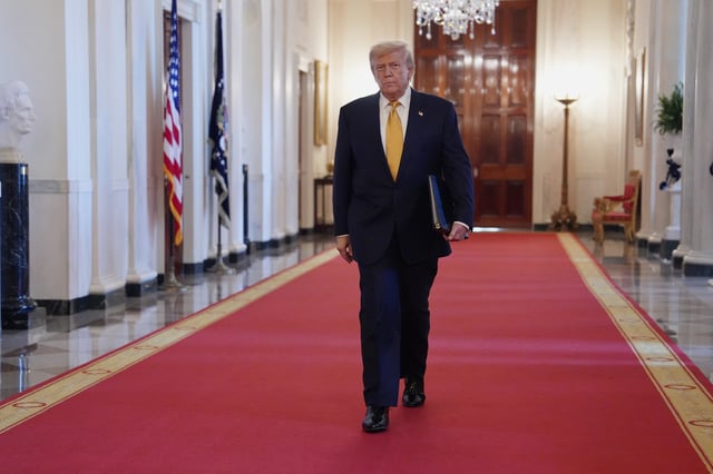 President Donald Trump arriving before speaking at a ceremony to sign the "Halt All Lethal Trafficking of Fentanyl Act," in the East Room of the White House, Wednesday, July 16, 2025, in Washington. (AP Photo/Evan Vucci)