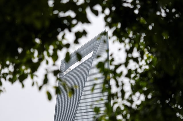 Shanghai World Financial Center, where a Wells Fargo office is situated, is pictured in the Lujiazui financial district in Shanghai, China, July 18, 2025. REUTERS/Go Nakamura