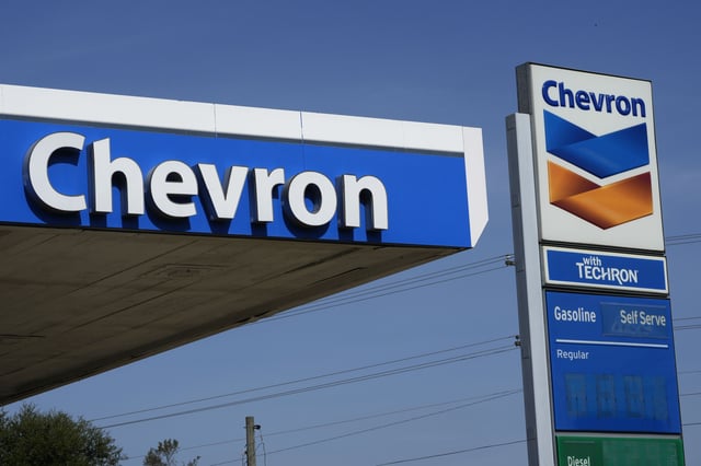 File - Chevron logos are displayed at a gas station in Columbus, Miss., Monday, Oct. 23, 2023.(AP Photo/Rogelio V. Solis, File)