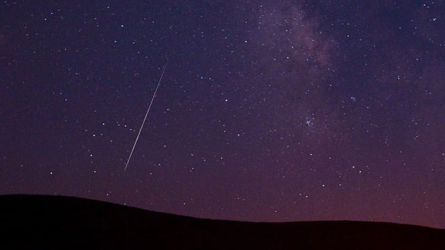To enjoy the meteor shower, find a dark area, and allow your eyes to adjust for 20-30 minutes. (AP Photo/Kevin Clifford, File)