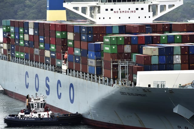 Container ship Cosco Development, registered and sailing under the flag of Hong Kong, with capacity for more than 13,000 containers, is seen at the Agua Clara locks in Colon, 56 miles from Panama City on May 2, 2017.