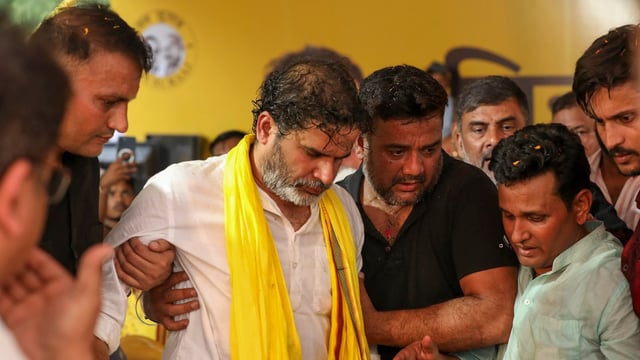 Jan Suraaj chief Prashant Kishore being assisted after an injury during the Bihar Badlav rally, in Arrah, Friday, July 18, 2025. 