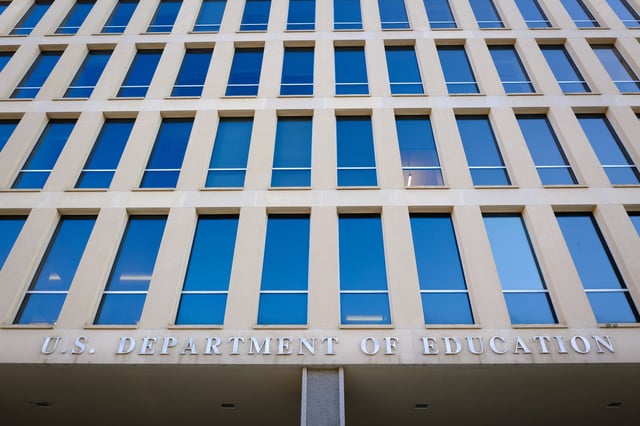 A sign marks the entrance to the U.S. Department of Education headquarters building on June 20, 2025, in Washington, DC.
