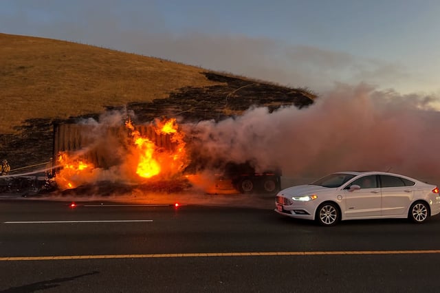 A fire sparked by a semitruck hauling almonds halted westbound traffic on the Altamont Pass around 4:30 a.m. on July 18. 