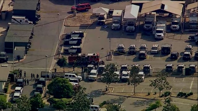 A fire truck and police are seen at a Los Angeles County Sheriff's Department training facility in Monterey Park, California, where a deadly explosion occurred on July 18.
