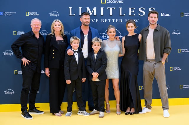 Craig Hemsworth, Leonie Hemsworth, Tristan Hemsworth, Chris Hemsworth, Sasha Hemsworth, Elsa Pataky, Gabriella Brooks and Liam Hemsworth stop for family photo at the London premiere of "Limitless: Live Better Now."