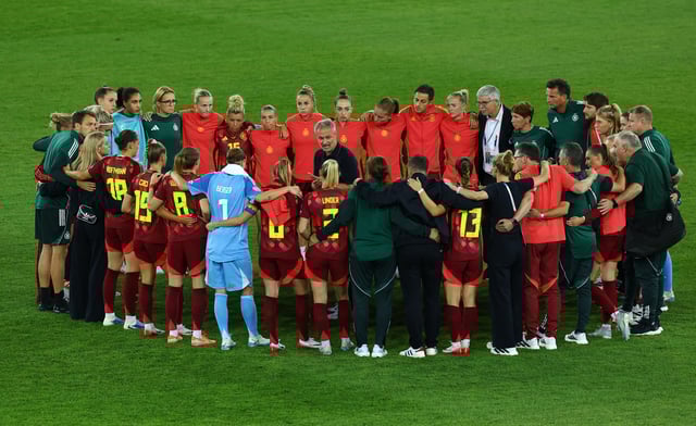Soccer Football - UEFA Women's Euro 2025 - Group C - Sweden v Germany - Stadion Letzigrund, Zurich, Switzerland - July 12, 2025  Germany coach Christian Wuck speaks to his plays after the match REUTERS/Piroschka Van De Wouw